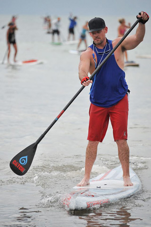The Lazy Dog Paddleboard Race follows a 3-mile ocean course that begins and ends at the Southernmost beach.
